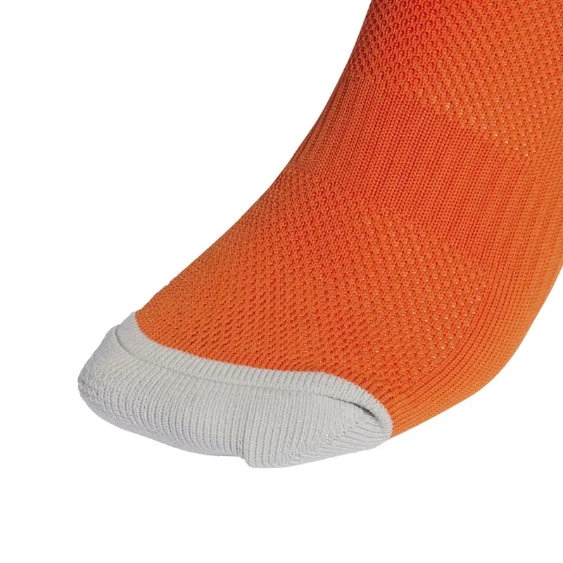 Futbalové gamaše Adidas IB7821, farba oranžová